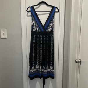 Black dress with white, blue and brown accents